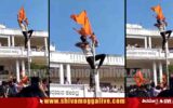 saffron flag hoisted at bapuji nagara college in shimoga